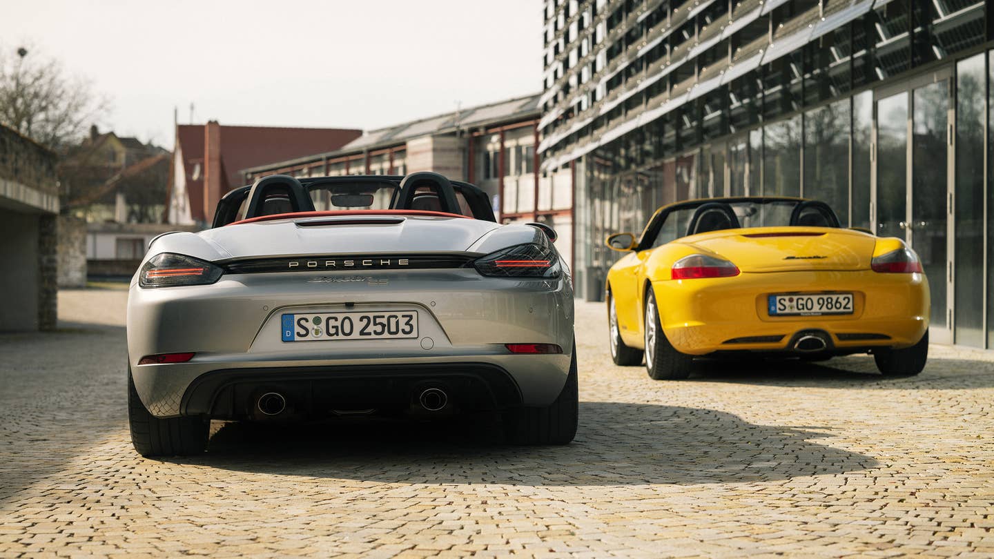 A Porsche 718 Boxster 25 Years next to a first-generation 986 model.