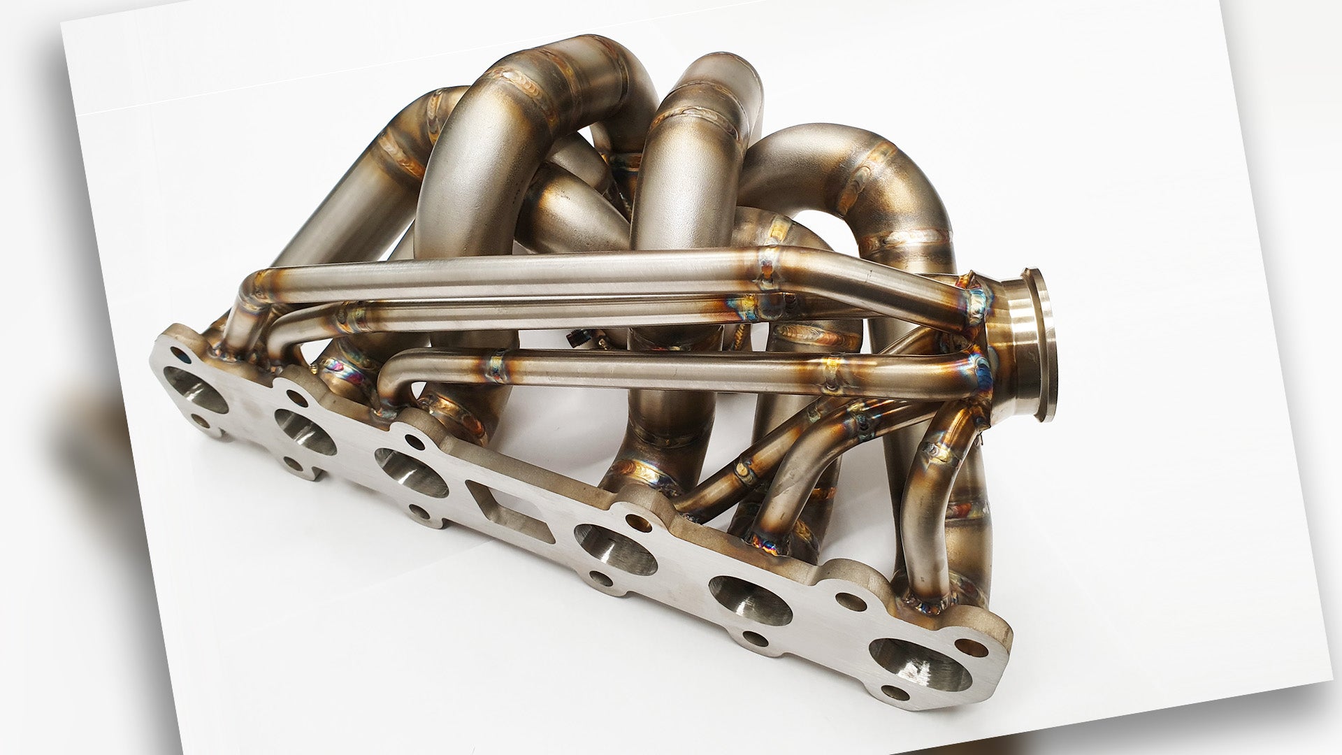 This 2JZ exhaust manifold utilizes EGR in reverse for anti-lag functionality.