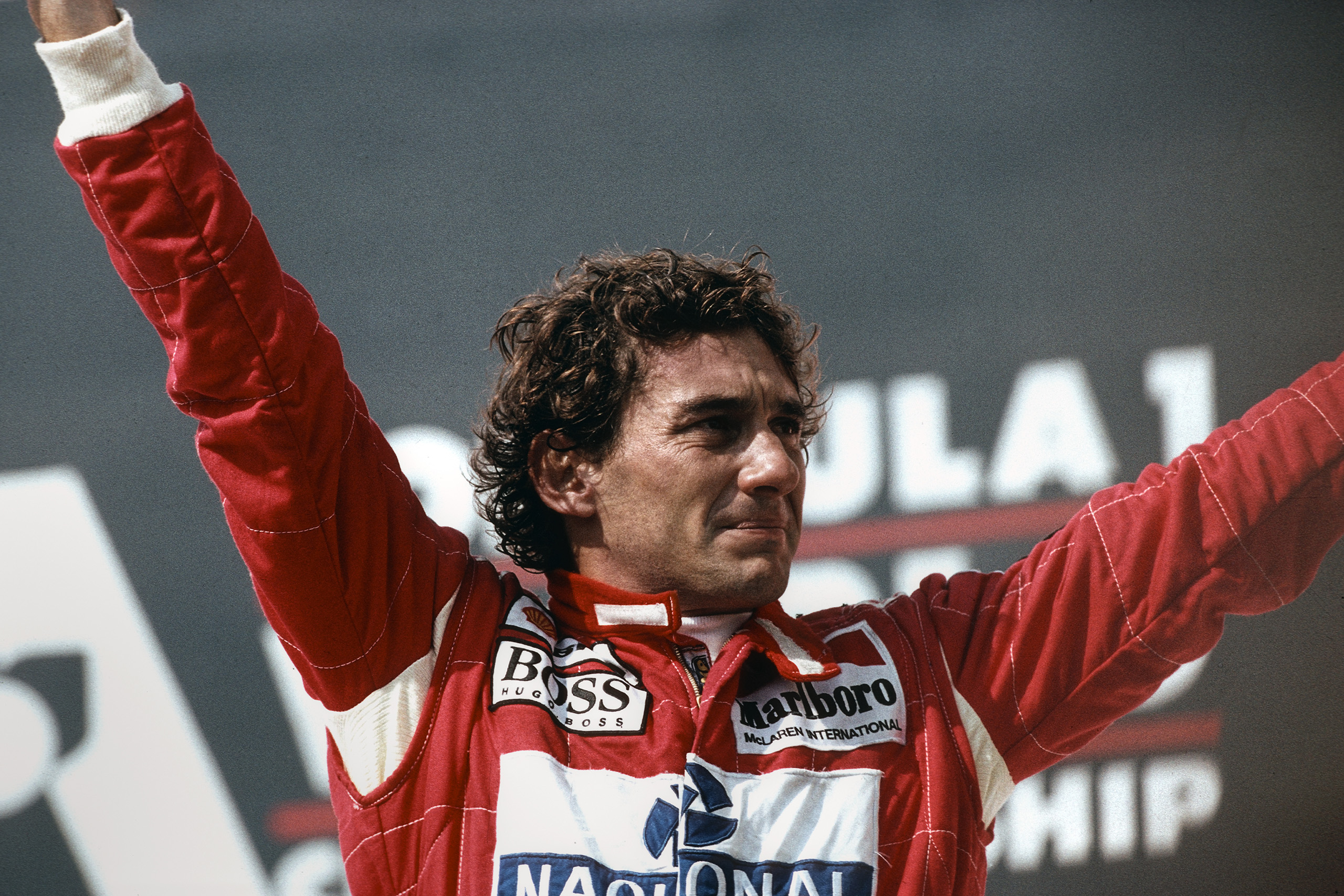 Senna celebrates following his victory at the 1993 Brazilian Grand Prix.