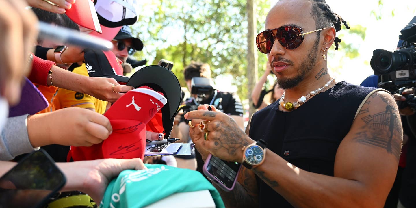 Lewis Hamilton Says ‘No Ferrari Caps’ to F1 Fans at Autograph Signing