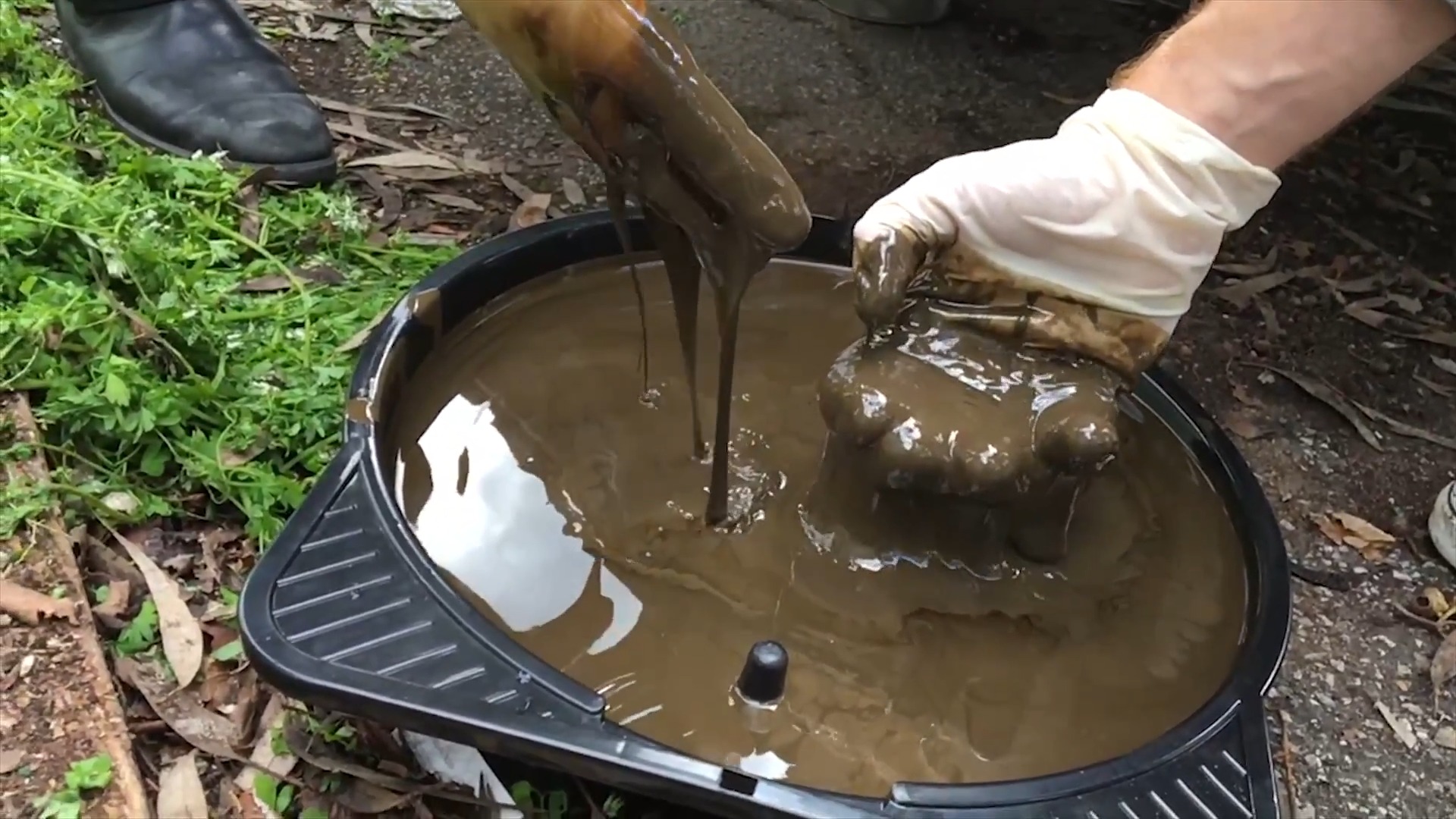 Sludgy automotive fluids.