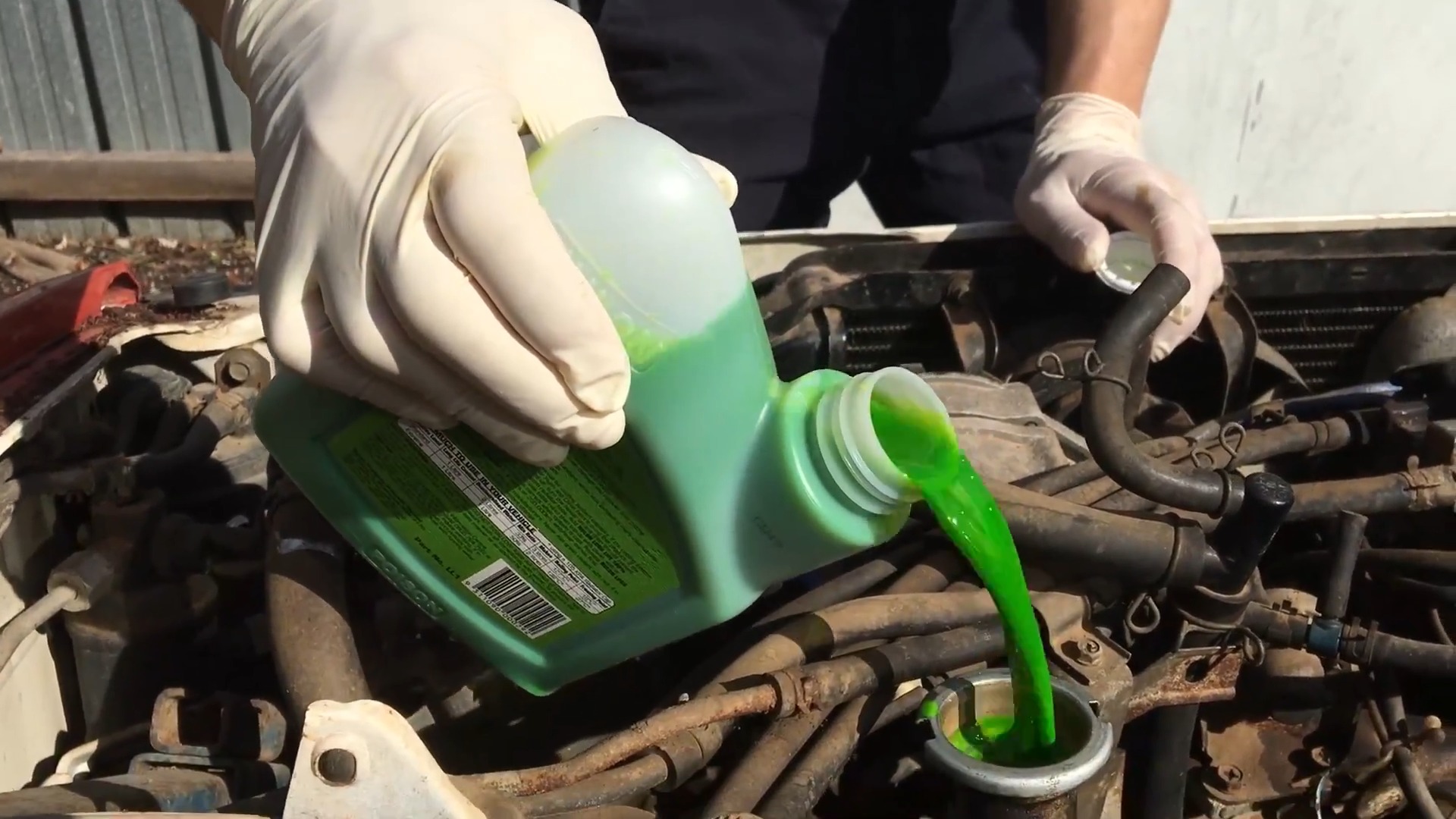 Pouring coolant into the oil filler by mistake.