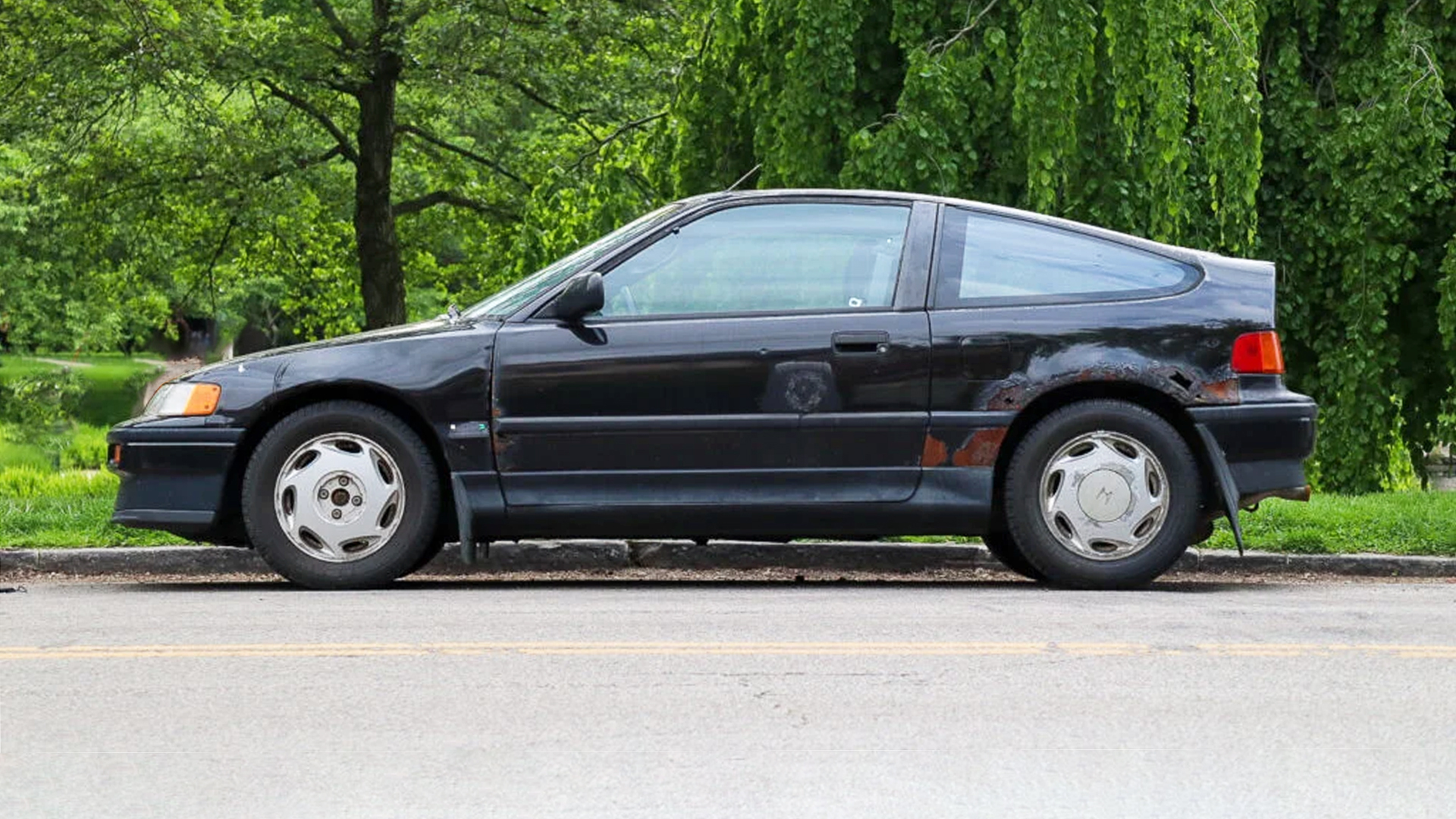 A rusty Honda CRX.