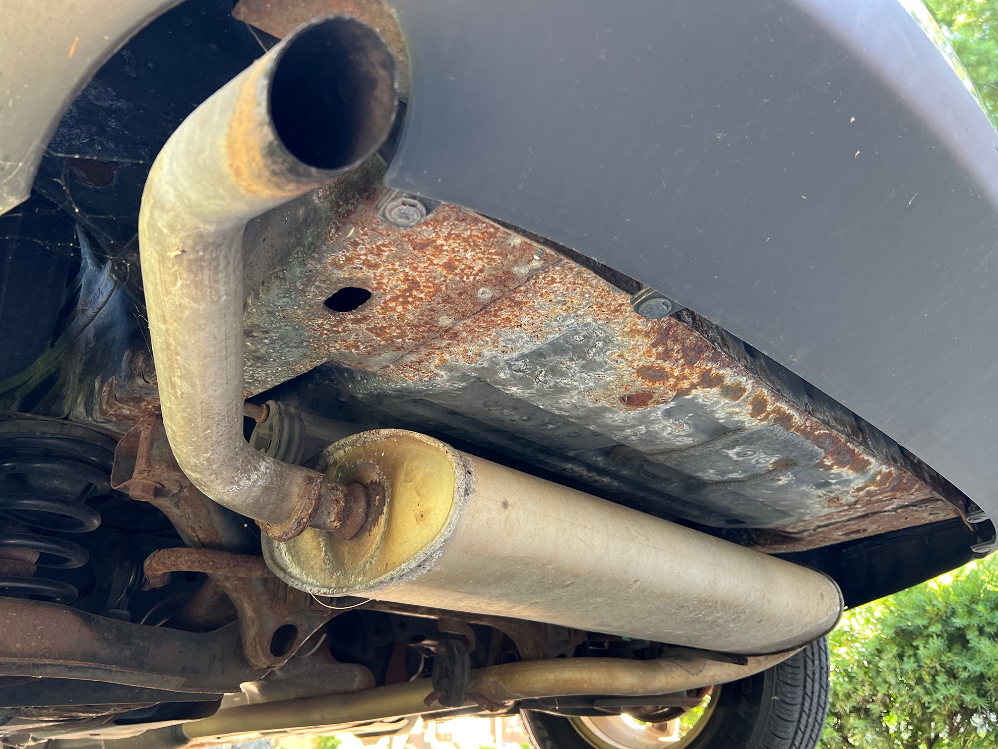 A muffler on a Saturn Vue.