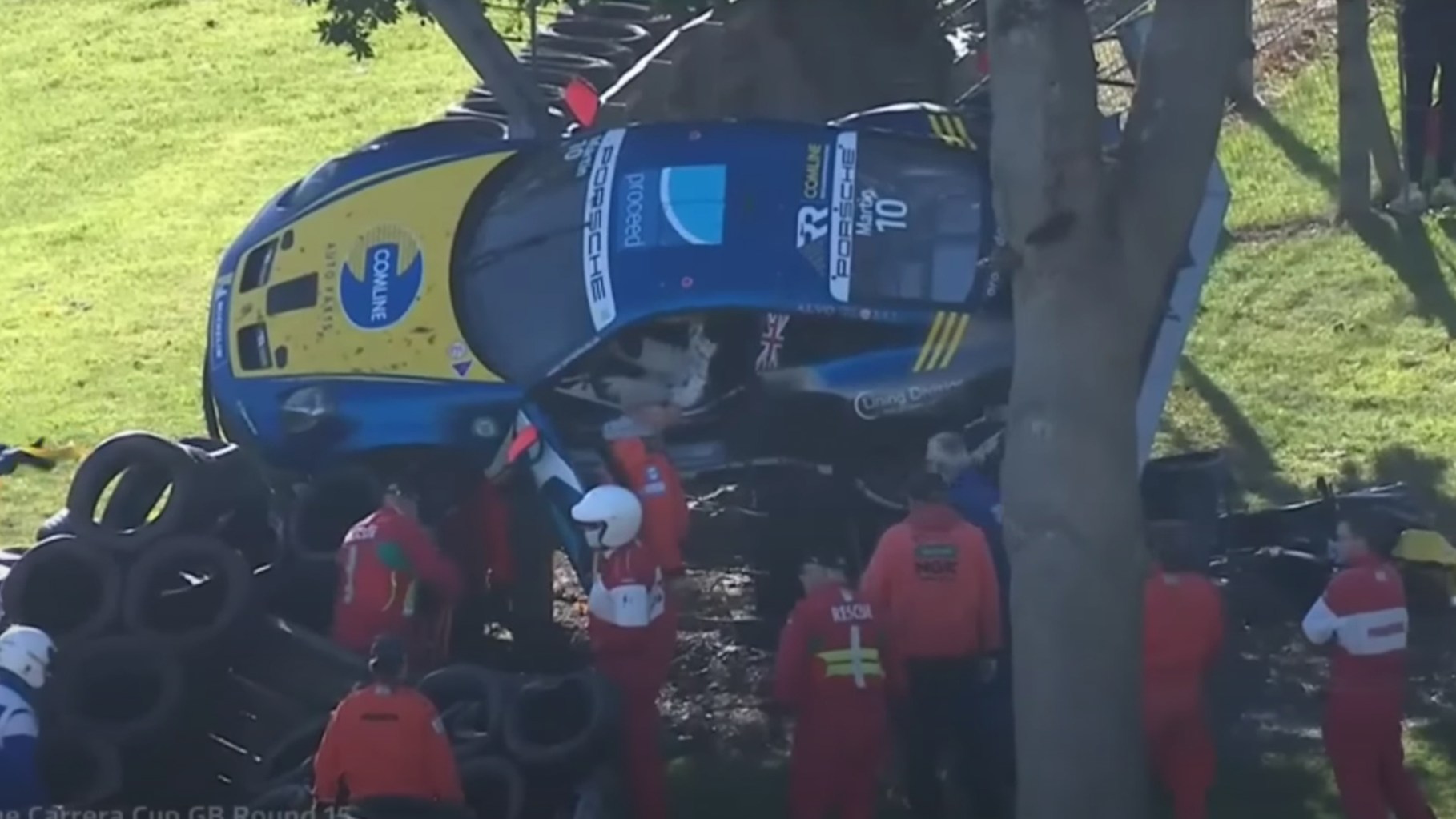 Porsche Race Car Gets Stuck in a Tree After Crash Sends It Flying ...