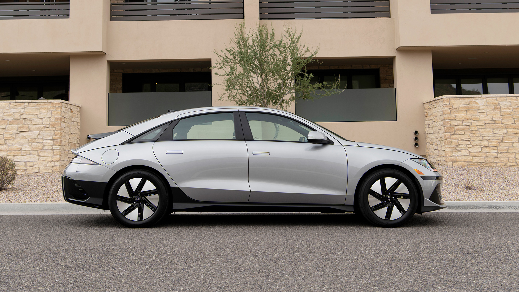 Side profile view of silver Hyundai Ioniq 6.