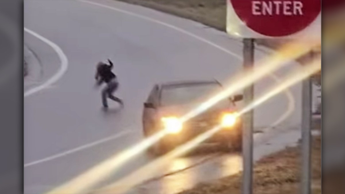 Watch a Panicking Driver Bail Out of Moving Car After Hitting Black Ice