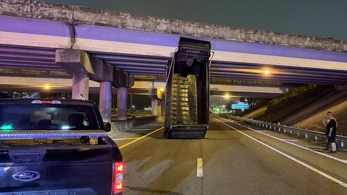 Driver Wedges Dump Truck Under Highway Overpass After Forgetting to ...