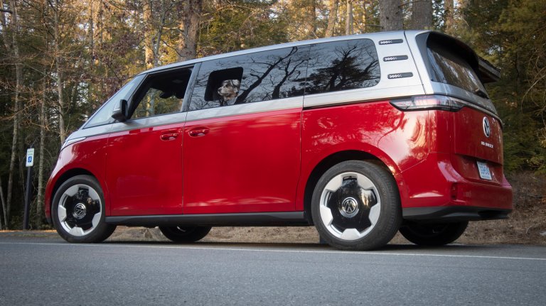 VW ID.Buzz side view with dog in the rear window