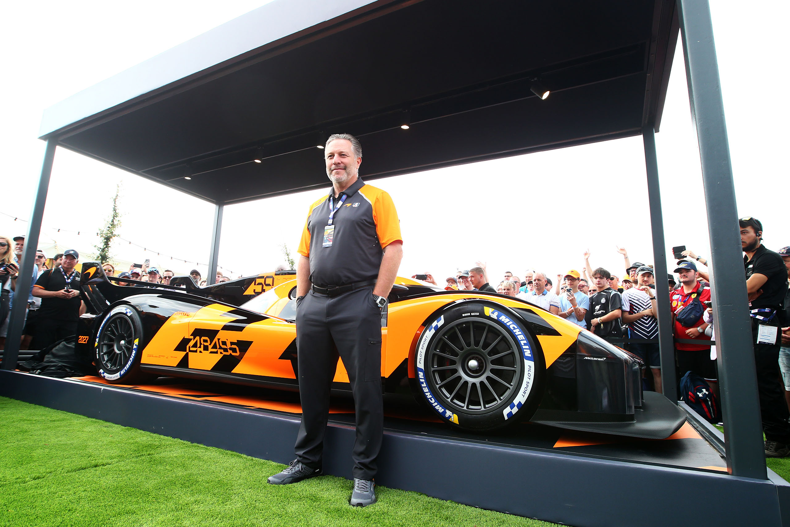 LE MANS, FRANCE - JUNE 14: McLaren Racing CEO Zak Brown poses with the new McLaren United Hypercar to debut in 2027 ahead of the 24 Hours of Le Mans at the Circuit de la Sarthe on June 14, 2025 in Le Mans, France. (Photo by Ker Robertson/Getty Images)