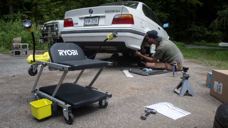 Ryobi creeper/stool in front of a BMW E36