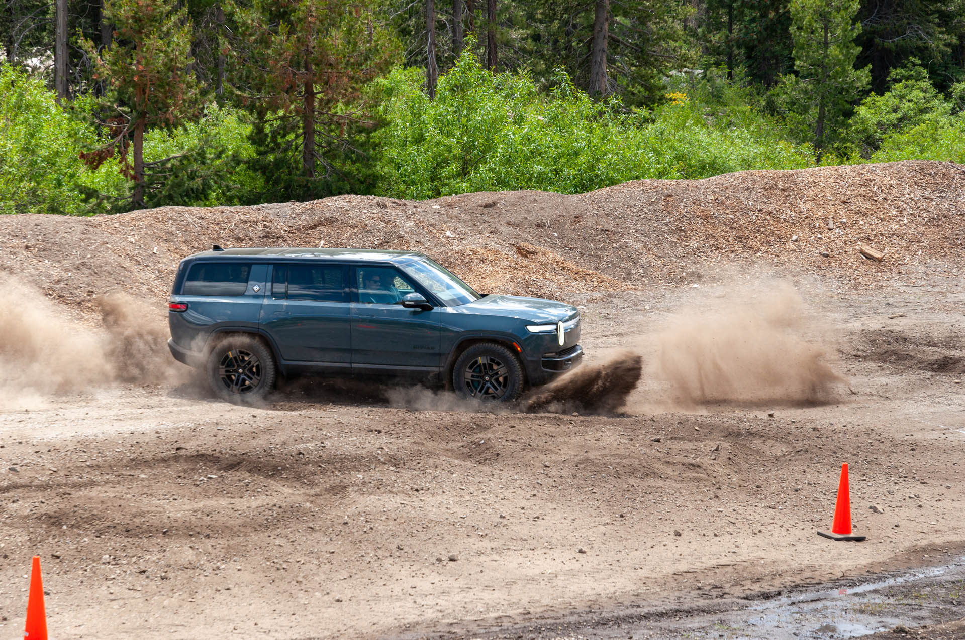 2026 Rivian R1S Quad performing Kick Turn