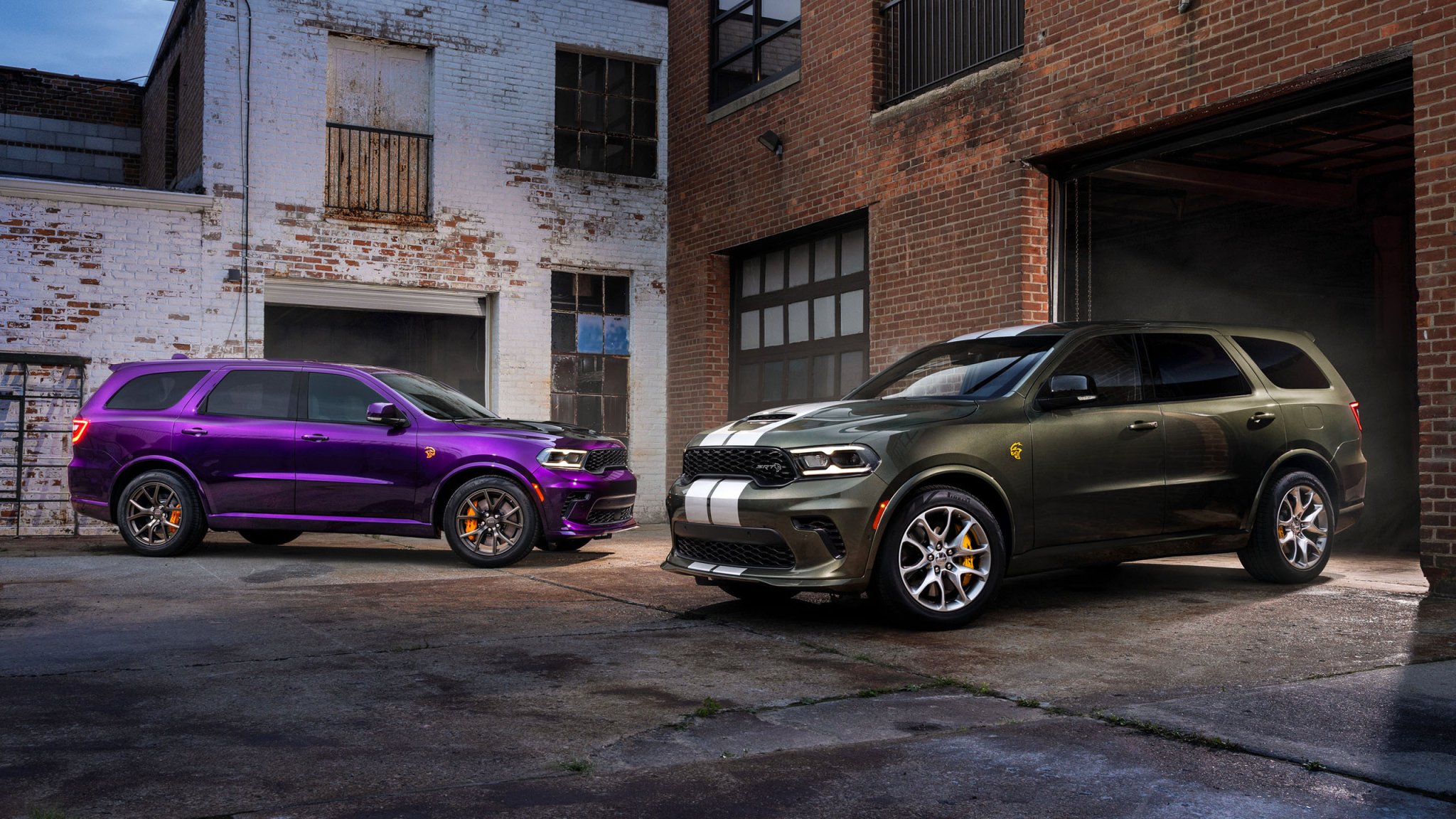 2026 Dodge Durango SRT Hellcat Jailbreak in Green Machine (front). A Jailbreak Custom Color program will allow select Dodge customers to paint their Durango SRT Hellcat Jailbreak in nearly any color imaginable, including Stryker Purple (shown at rear).