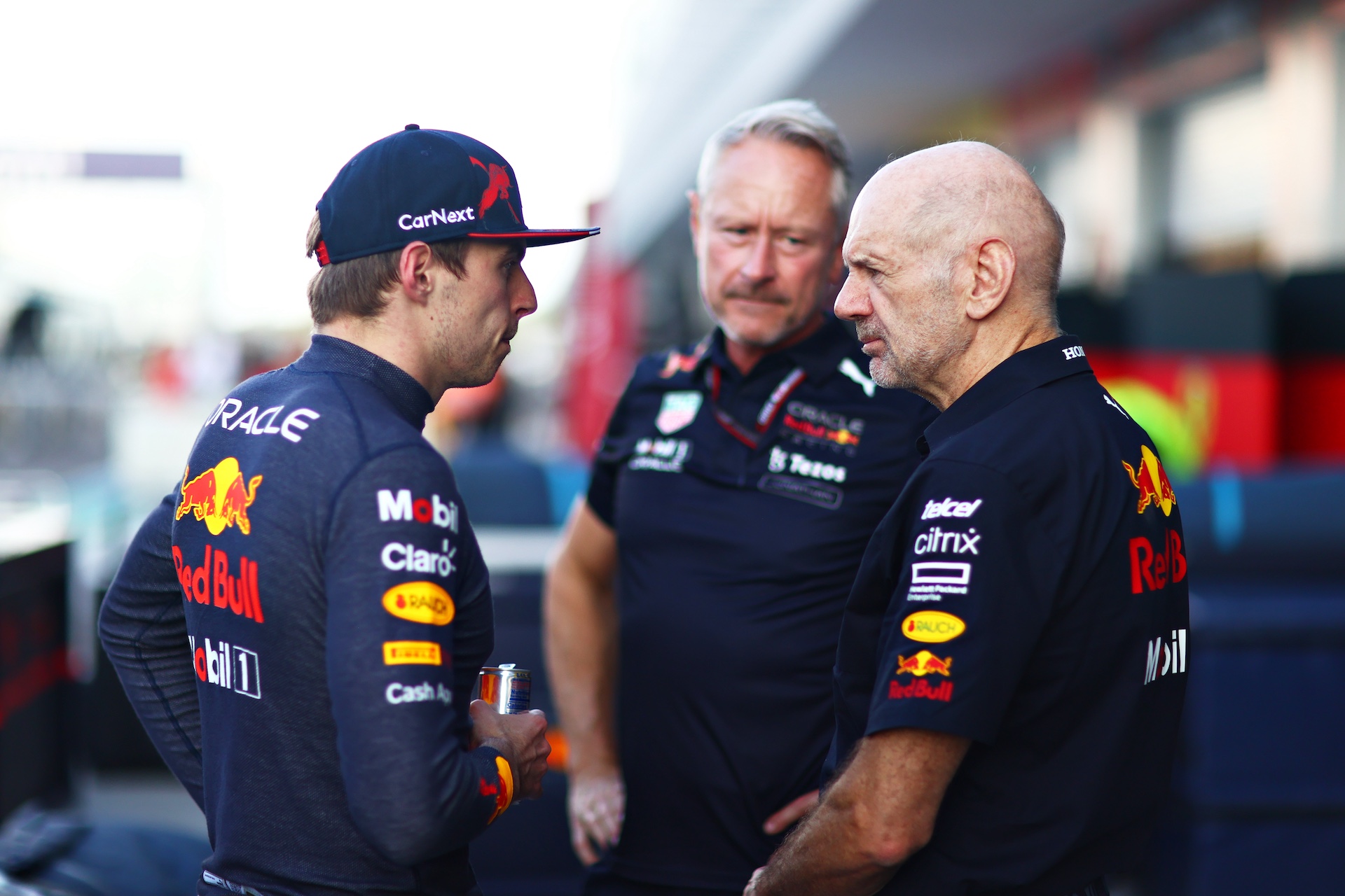 MIAMI, FLORIDA - MAY 08: Race winner Max Verstappen of the Netherlands and Oracle Red Bull Racing talks with Red Bull Racing Team Manager Jonathan Wheatley and Adrian Newey, the Chief Technical Officer of Red Bull Racing after the F1 Grand Prix of Miami at the Miami International Autodrome on May 08, 2022 in Miami, Florida. (Photo by Dan Istitene - Formula 1/Formula 1 via Getty Images)