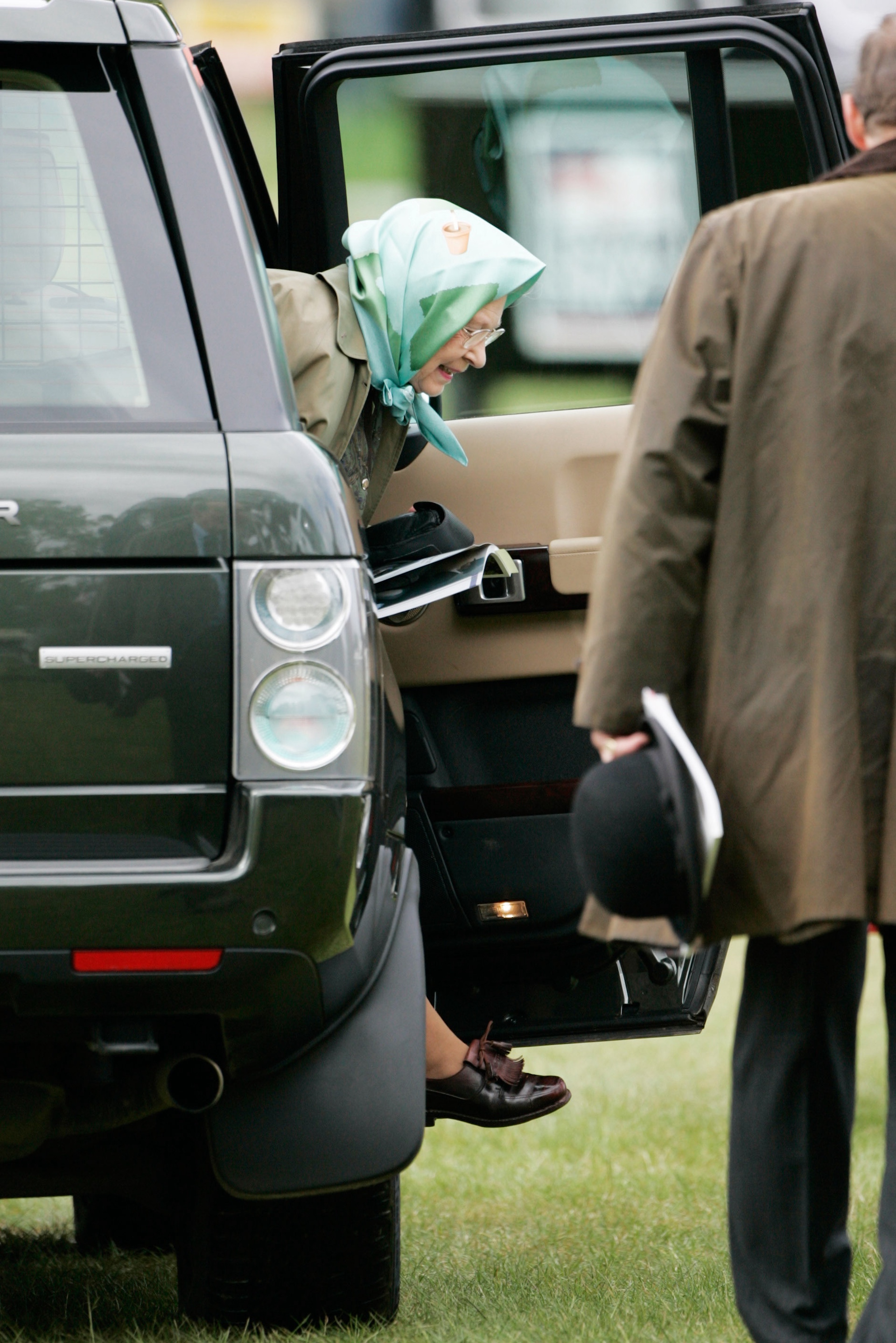 WINDSOR, ENGLAND - MAY 11: Queen Elizabeth II arrives by Range Rover to watch the second day of Royal Windsor Horse Show on May 11, 2007 in Berkshire, England. (Photo by Tim Graham Photo Library via Getty Images)