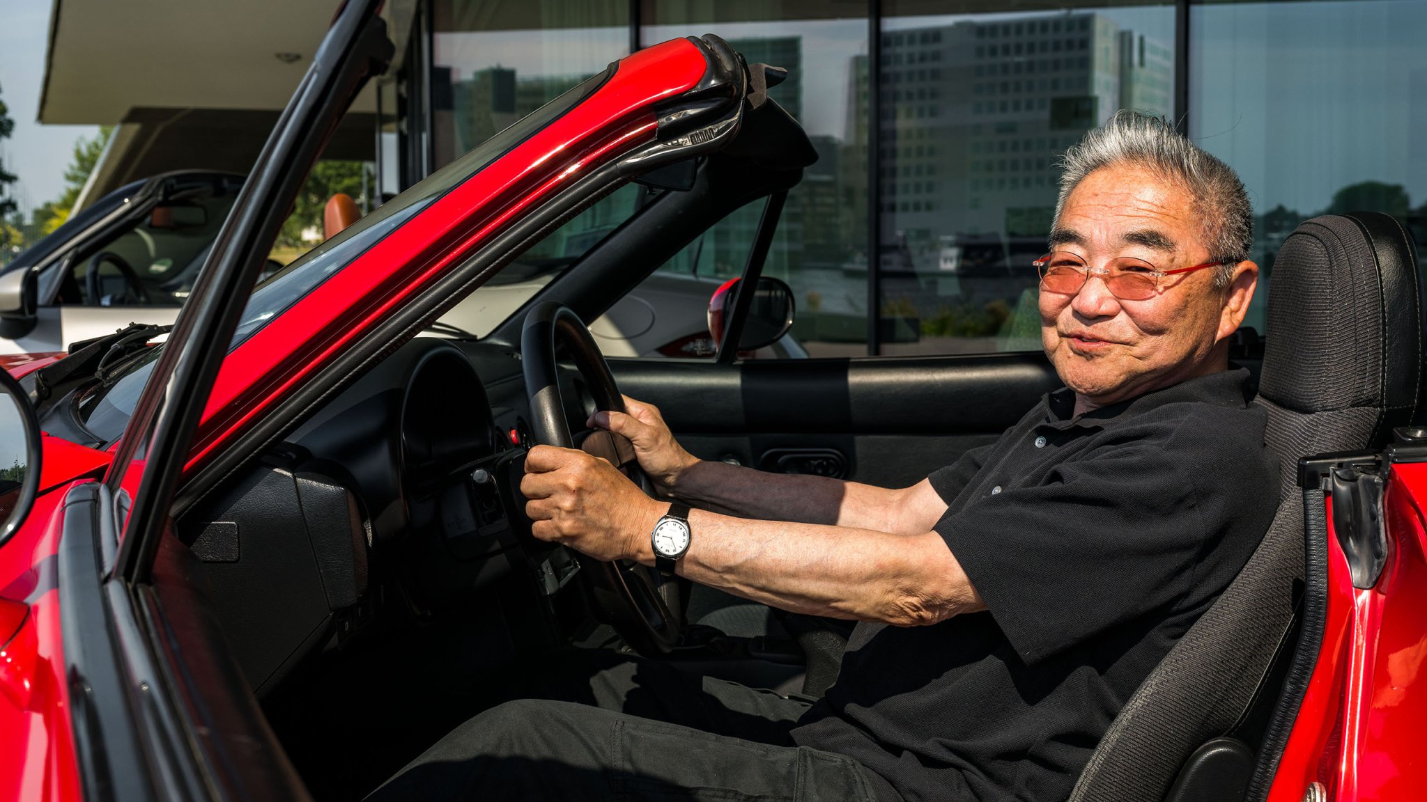 Tom Matano poses in Miata