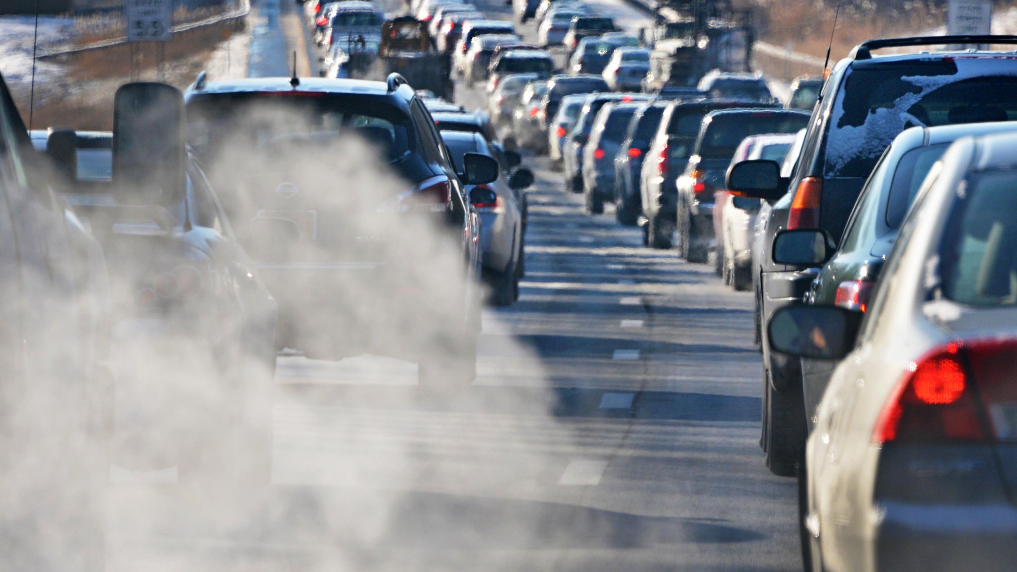 Car emissions are visible in the cold morning air as southbound traffic makes slow progress on the Northway Wednesday morning Jan. 23, 2013. (Photo by John Carl D'Annibale/Albany Times Union via Getty Images)