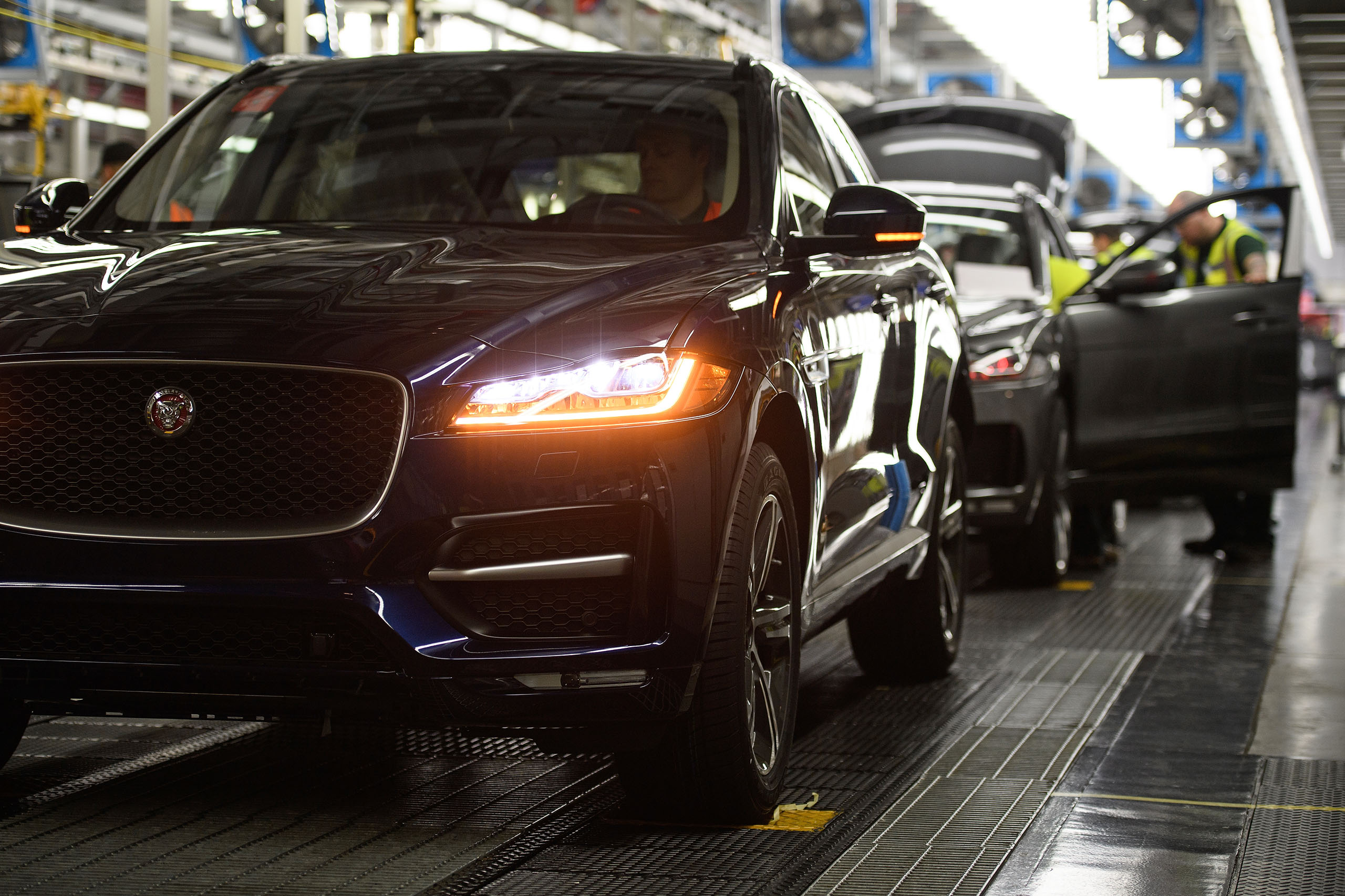 SOLIHULL, ENGLAND - MARCH 06: Vehicles are checked before moving to the next stage of production at the Jaguar Land Rover factory on March 1, 2017 in Solihull, England. The company has pledged it's 'heart and soul' to production in the UK after producing the new "Velar" model for global sale, at their Solihull factory. (Photo by Leon Neal/Getty Images)