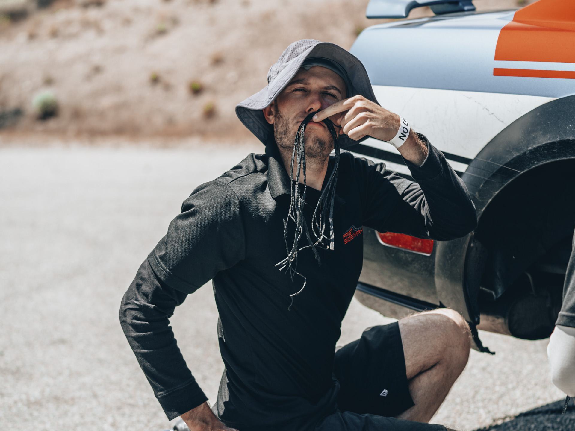 Person playing with tire pieces.