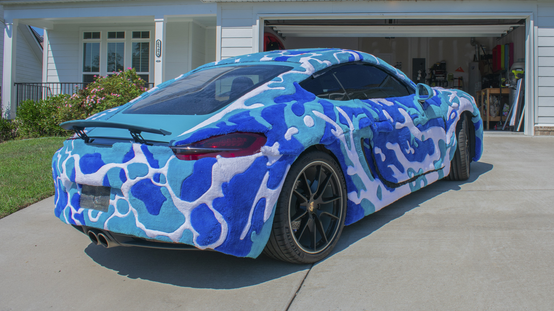 Porsche Cayman with rug wrap.