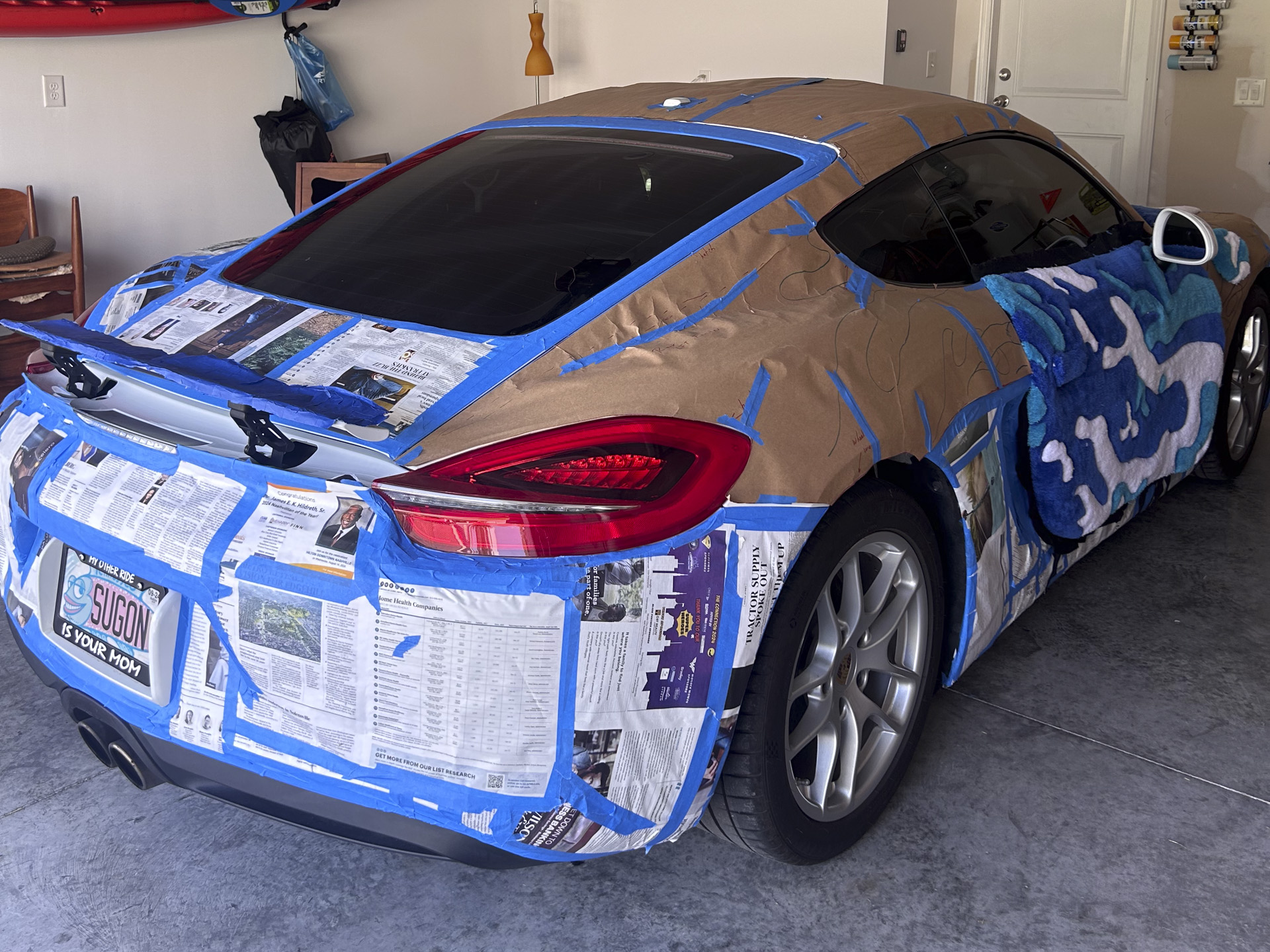 Porsche Cayman rug wrap assembly.