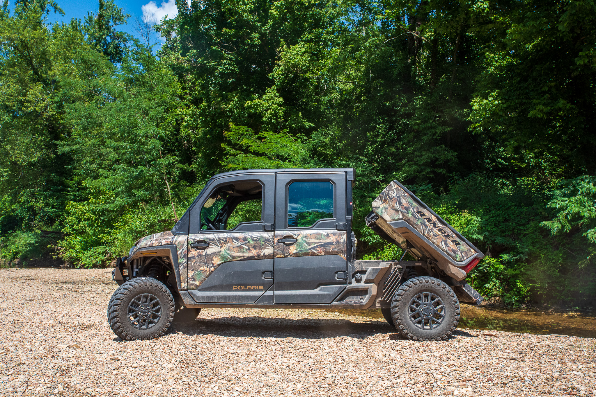 Polaris Ranger XD 1500 posed next to a creek
