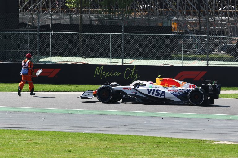 A marshal on track and Liam Lawson of Racing Bulls during the Formula 1 Grand Prix of Mexico City at Autódromo Hermanos Rodríguez in Mexico City, Mexico on October 26, 2025. (Photo by Jakub Porzycki/NurPhoto)