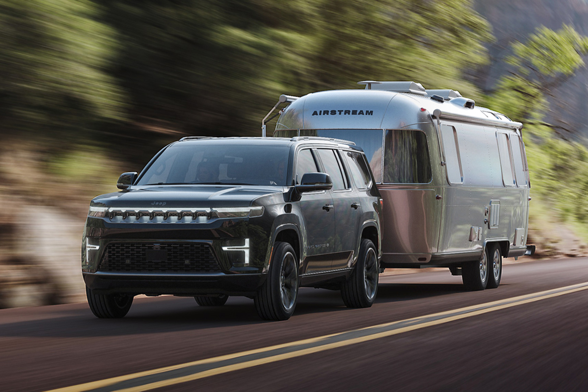 2026 Jeep Grand Wagoneer towing an Airstream camper