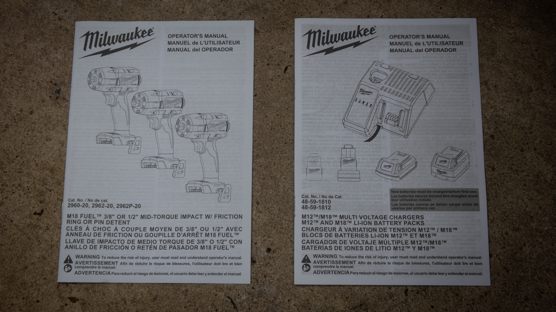 Milwaukee 1/2-inch drive mid-torque impact gun and battery instruction manual.