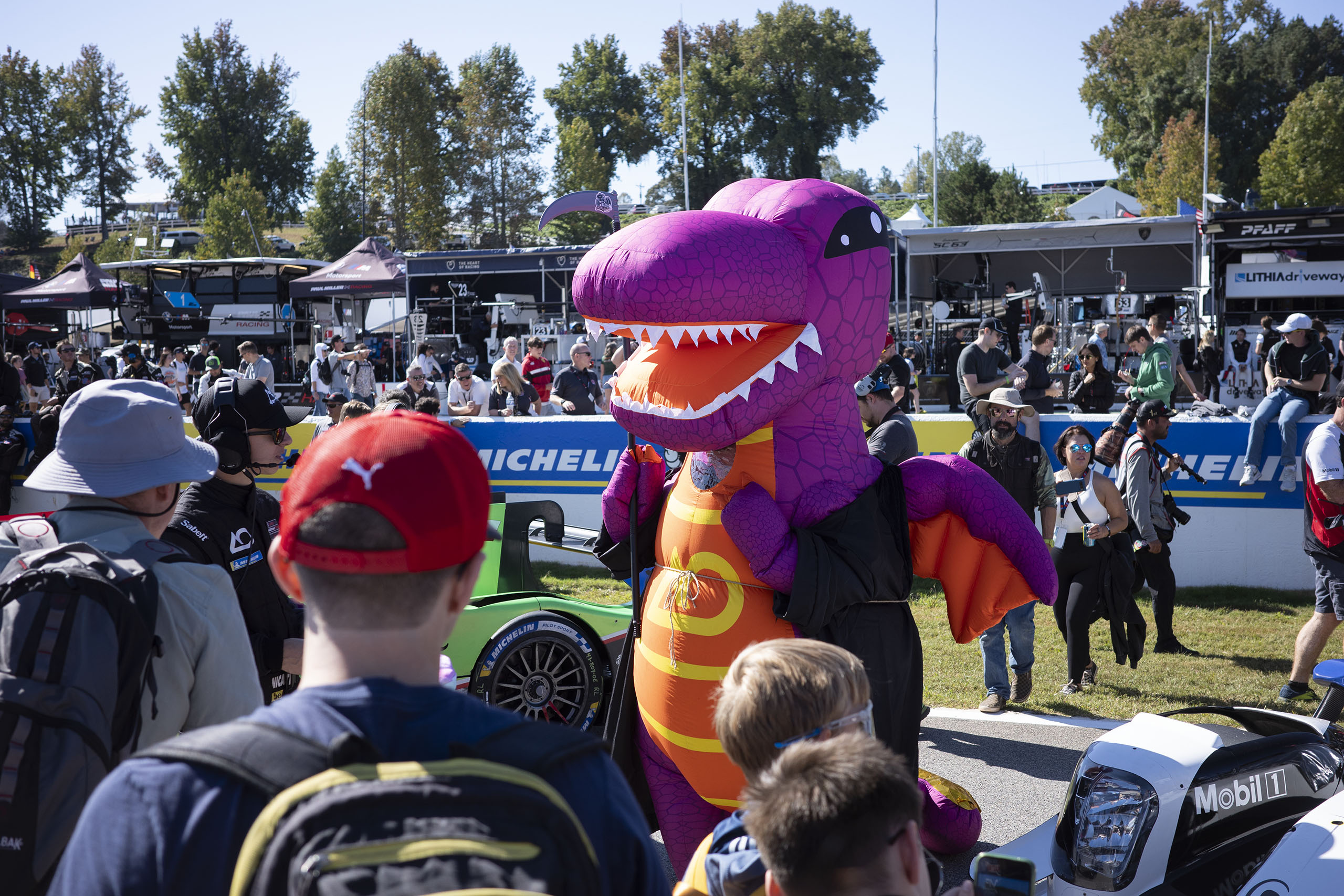 Dinosaur mascot at Petit Le Mans