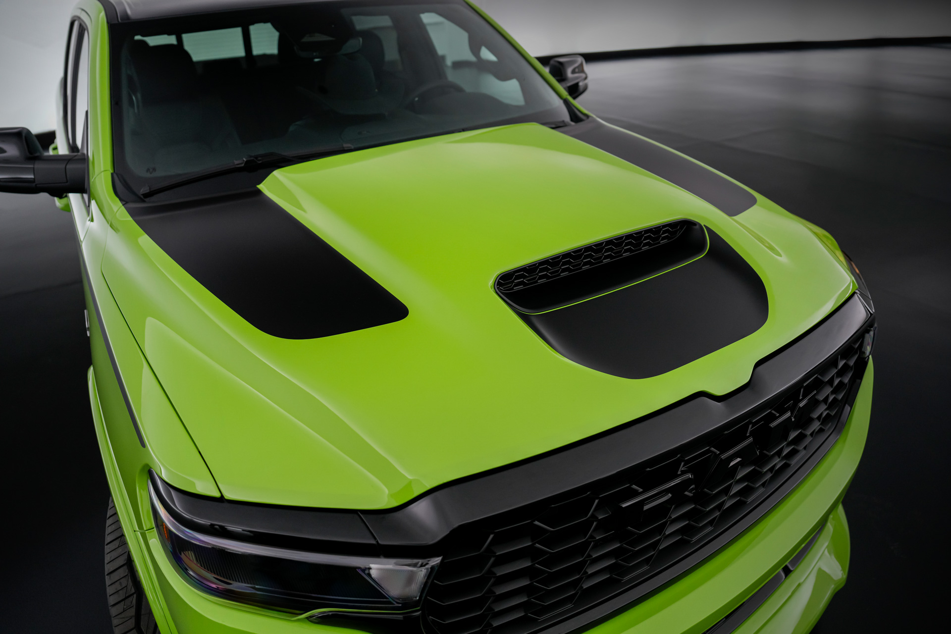 The custom performance hood on The Dude concept features black side and scoop bezel stripes, adding to the eye-catching color contrast.