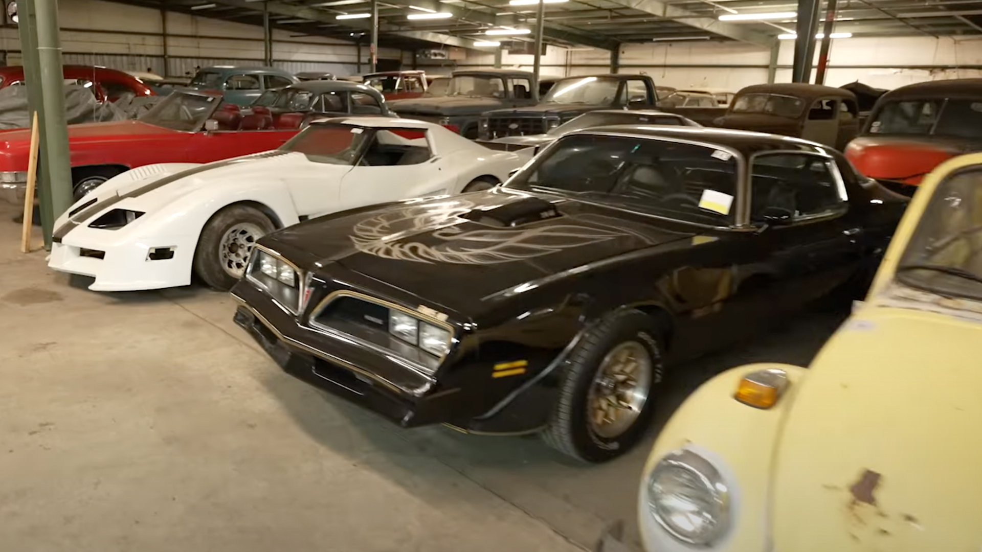 Trans-Am, Corvette, and a Beetle for sale.