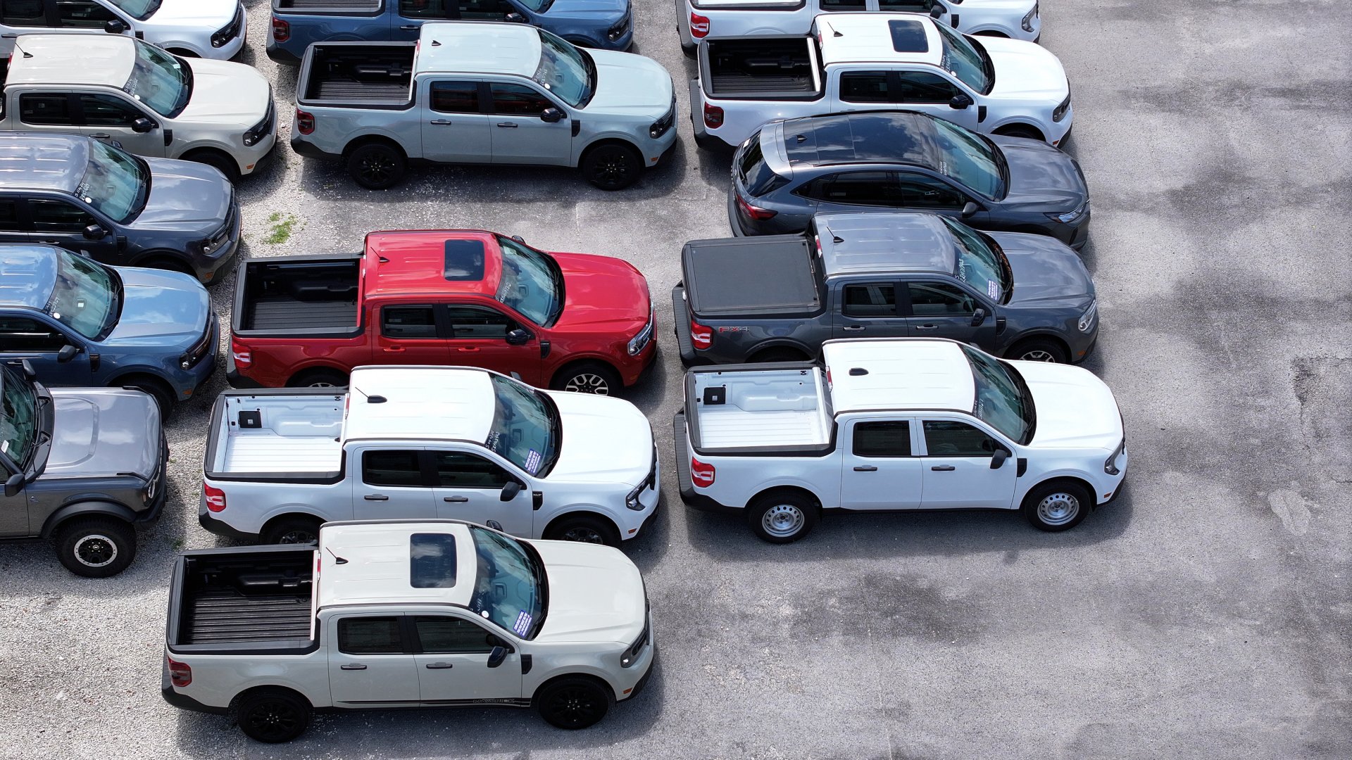 An aerial view as Ford vehicles are lined up on the sales lot of the Metro Ford dealership on May 06, 2025 in Miami, Florida.