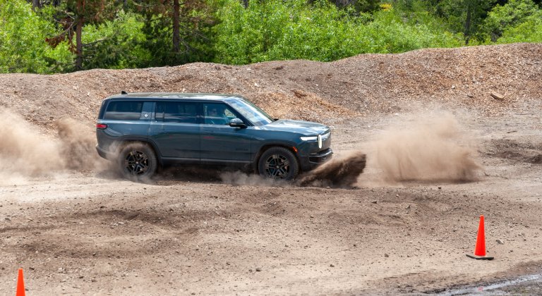 2026 Rivian R1S Quad performing a Kick Turn