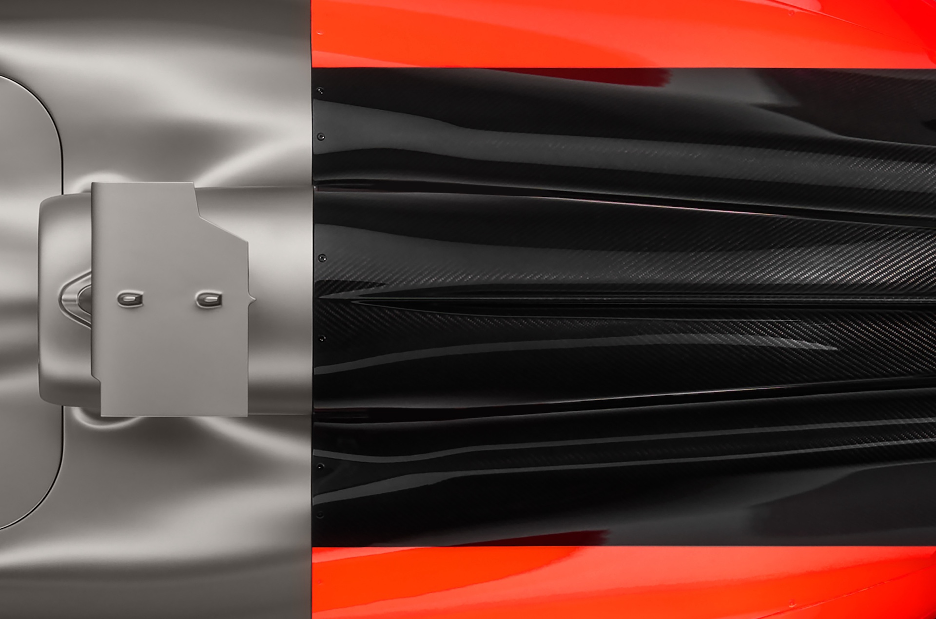 Indoor studio shot, exterior, bird’s-eye view, detail of air intake and engine cover