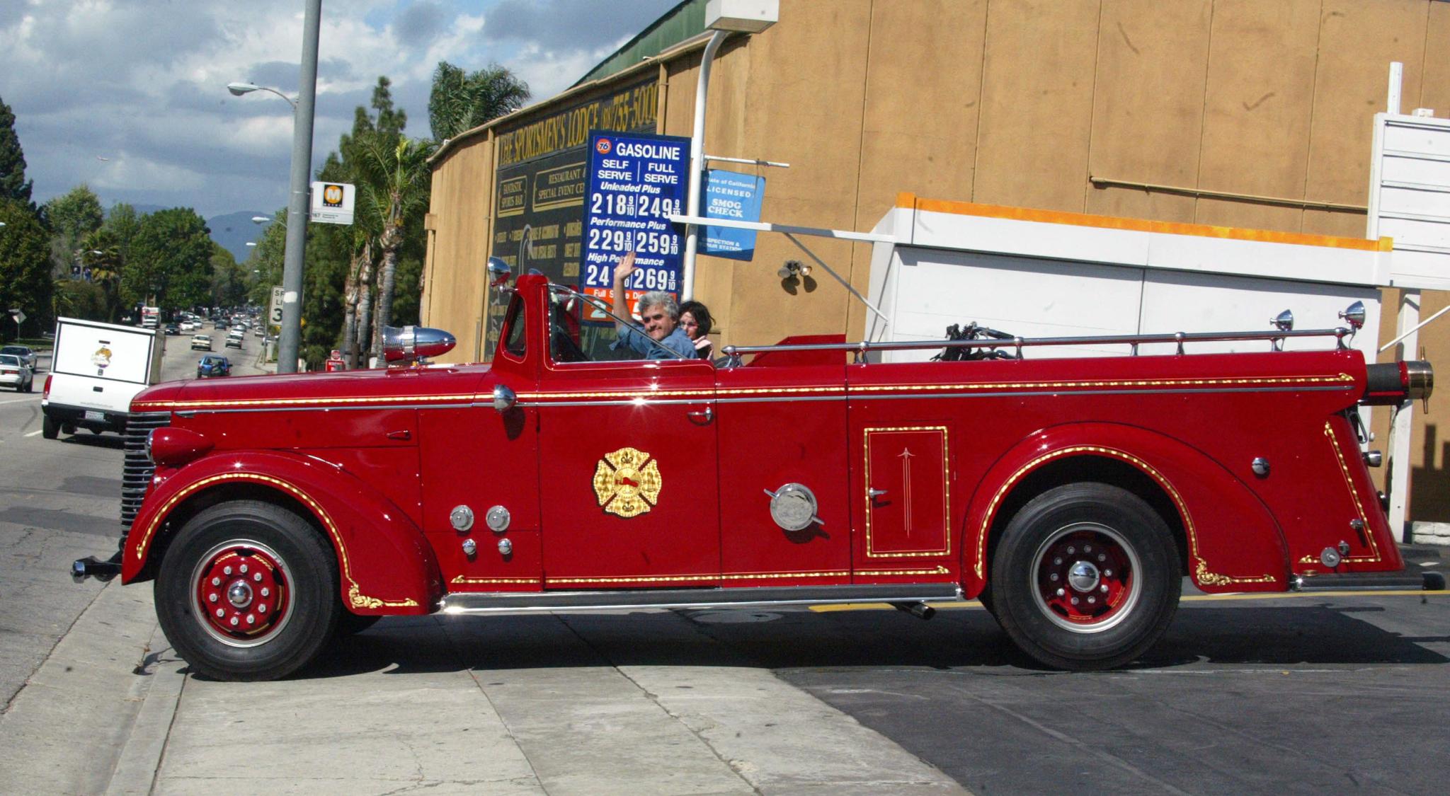 Jay Leno in a 1941 American La France Fire Truck