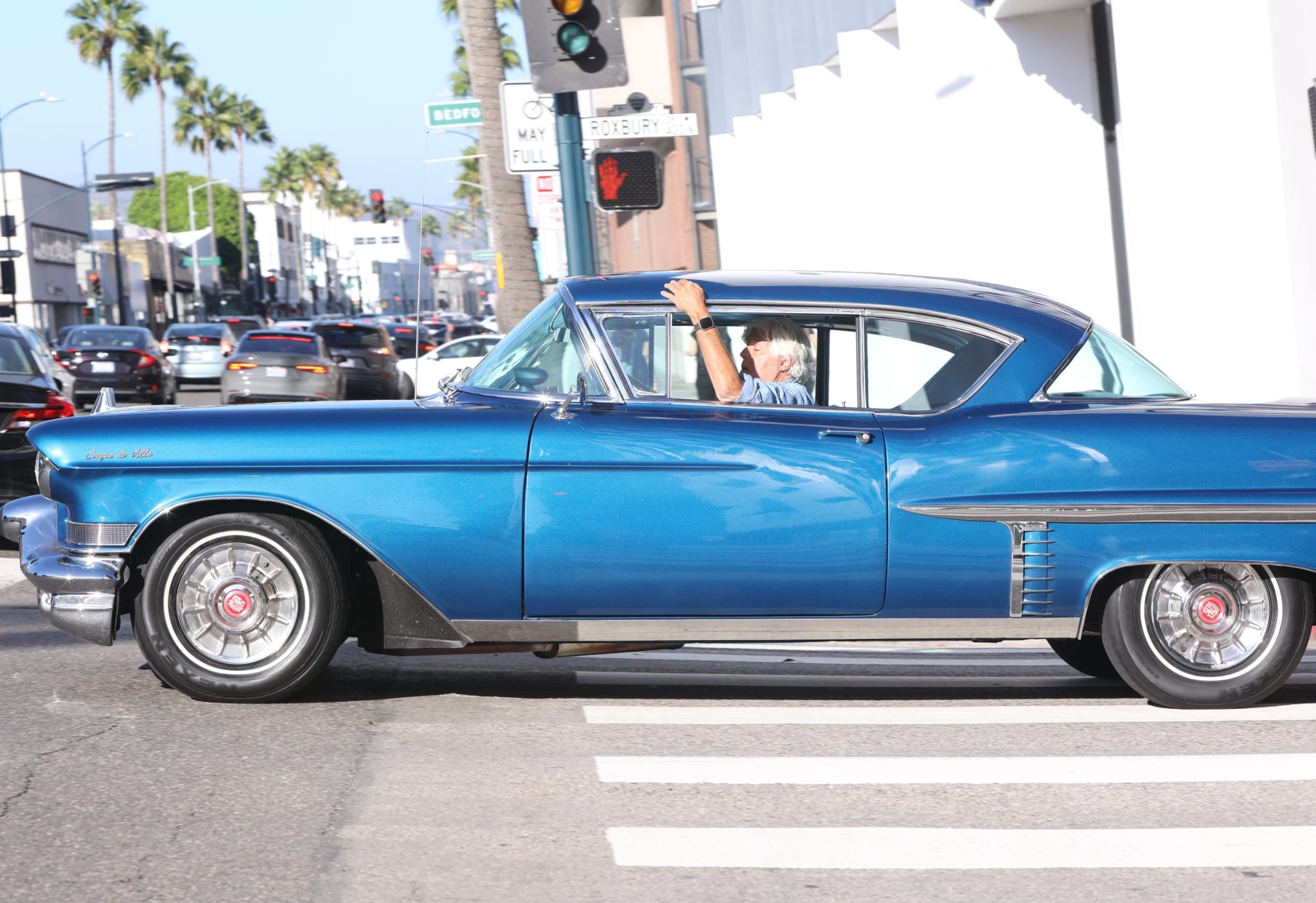 Jay Leno in a 1957 Cadillac Coupe de Ville