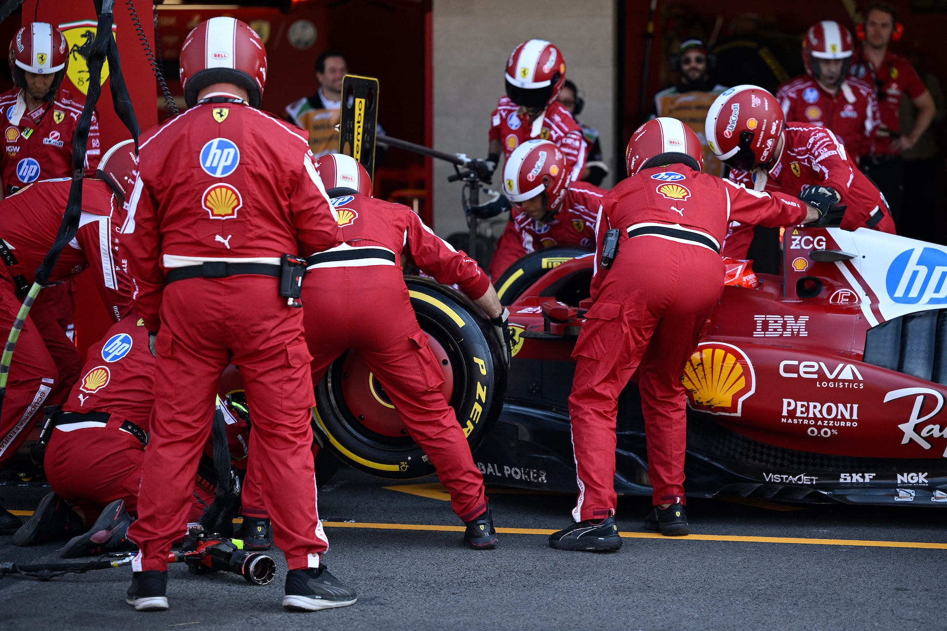 Ferrari's Monegasque driver Charles Leclerc makes a pit stop during the Mexico City Formula One Grand Prix at the Hermanos Rodriguez racetrack in Mexico City on October 26, 2025. (Photo by Alfredo ESTRELLA / POOL / AFP)