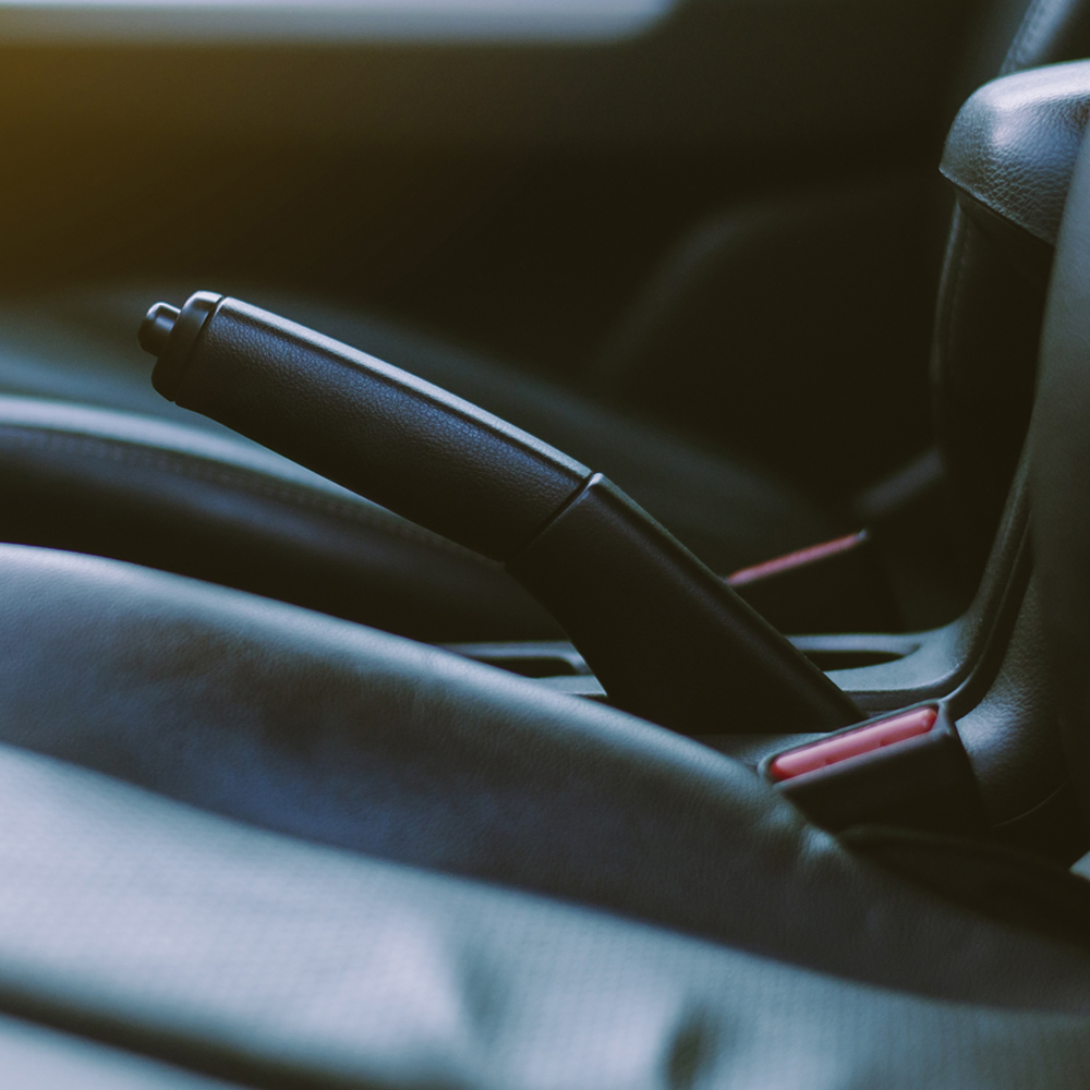 Mechanical parking brake handle.