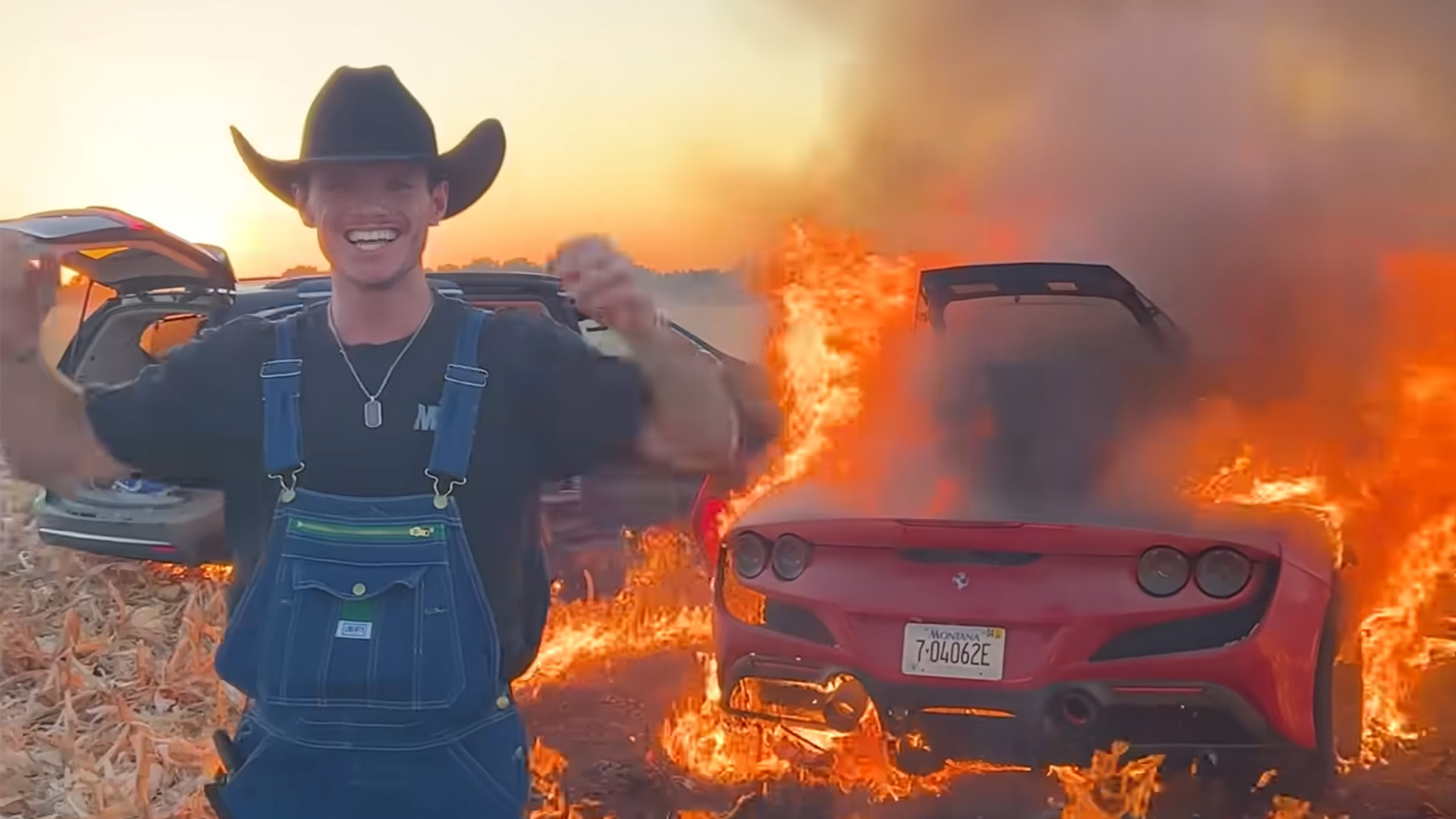 WhistlinDiesel in front of burning Ferrari F8 Tributo