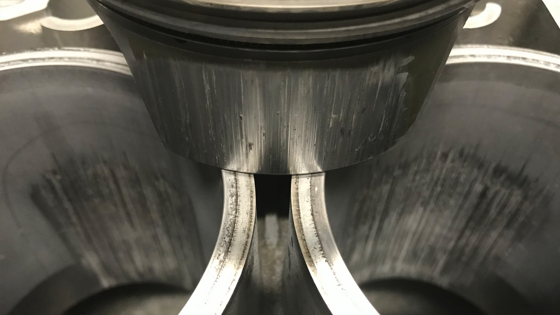 Bore-scored pistons.