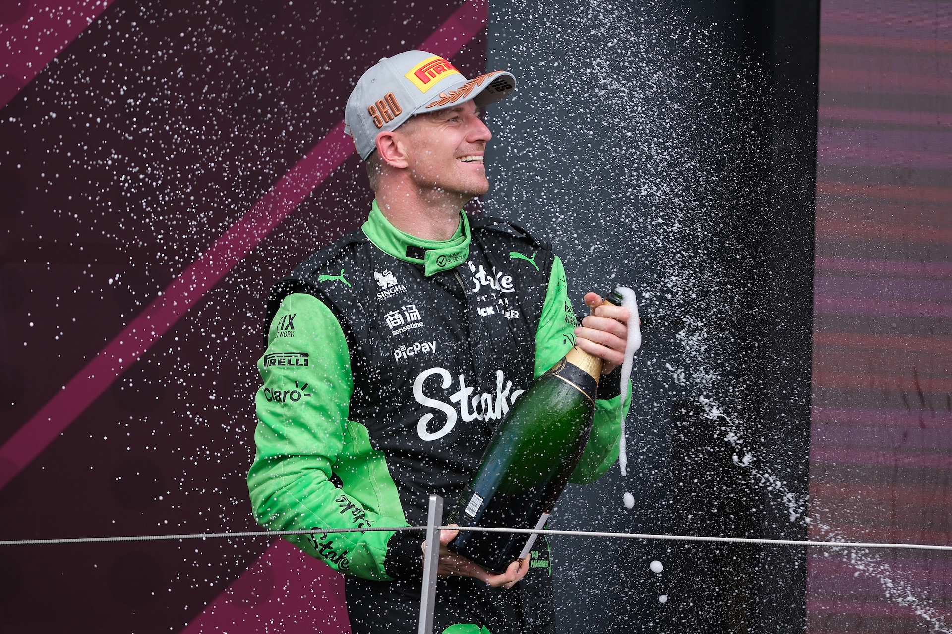TOWCESTER, UNITED KINGDOM - 2025/07/06: Nico Hulkenberg of Stake F1 Team Kick Sauber celebrates on the podium during the Formula One British Grand Prix at Silverstone. Lando Norris of McLaren F1 Team winner of the British Grand Prix. (Photo by Paul Bonser/SOPA Images/LightRocket via Getty Images)