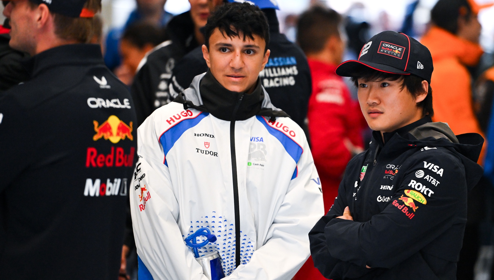 SPA, BELGIUM - JULY 27: Isack Hadjar of France and Visa Cash App Racing Bulls and Yuki Tsunoda of Japan and Oracle Red Bull Racing on the drivers parade prior to the F1 Grand Prix of Belgium at Circuit de Spa-Francorchamps on July 27, 2025 in Spa, Belgium. (Photo by Rudy Carezzevoli/Getty Images)