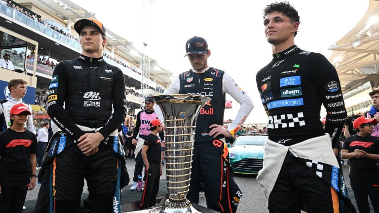 ABU DHABI, UNITED ARAB EMIRATES - DECEMBER 07: F1 World Drivers Championship contenders Lando Norris of Great Britain and McLaren Max Verstappen of the Netherlands and Oracle Red Bull Racing and Oscar Piastri of Australia and McLaren on the grid during the F1 Grand Prix of Abu Dhabi at Yas Marina Circuit on December 07, 2025 in Abu Dhabi, United Arab Emirates. (Photo by Mark Sutton - Formula 1/Formula 1 via Getty Images)
