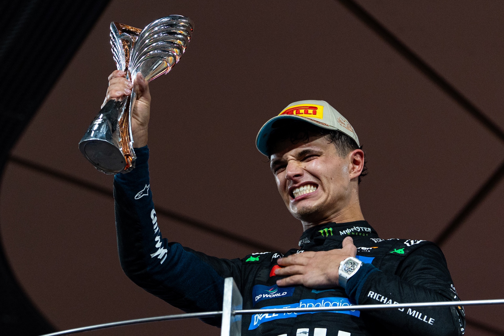 ABU DHABI, UNITED ARAB EMIRATES - DECEMBER 7: Lando Norris of Great Britain and McLaren celebrates on the podium during the F1 Grand Prix of Abu Dhabi at Yas Marina Circuit on December 7, 2025 in Abu Dhabi, United Arab Emirates. (Photo by Kym Illman/Getty Images)