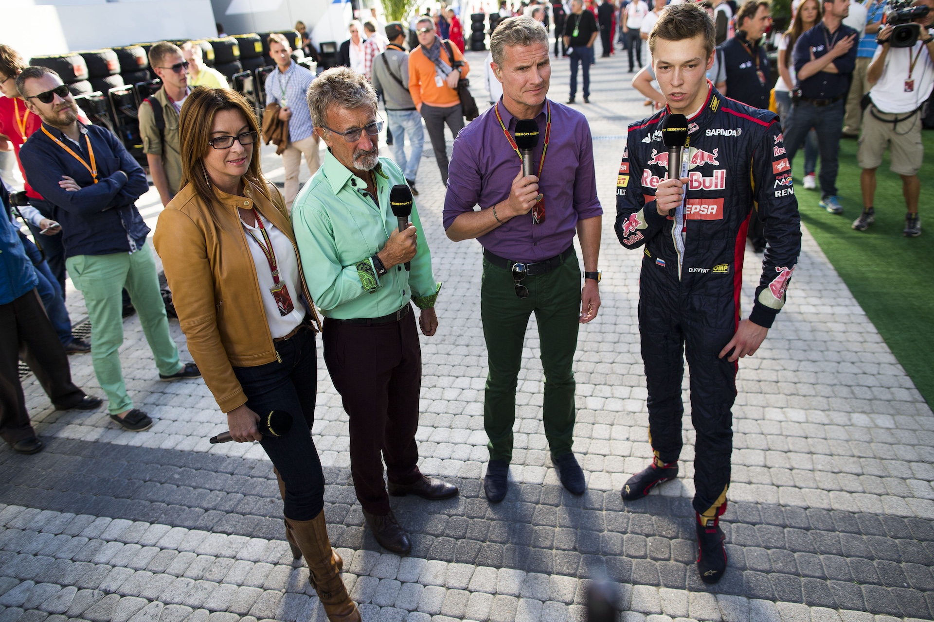 SOCHI, RUSSIA - OCTOBER 11: Daniil Kvyat of Toro Rosso and Russia speaks with David Coulthard, Eddie Jordan and Suzi Perry of the BBC after qualifying for the Russian Formula One Grand Prix at Sochi Autodrom on October 11, 2014 in Sochi, Russia. (Photo by Peter Fox/Getty Images)