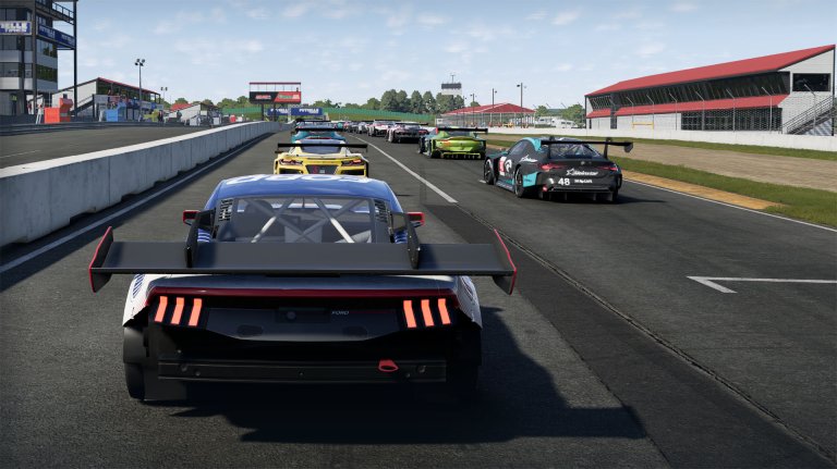 Starting a race in Project Motor Racing where the player's Mustang is missing a rear bumper and its rear wing is improperly positioned