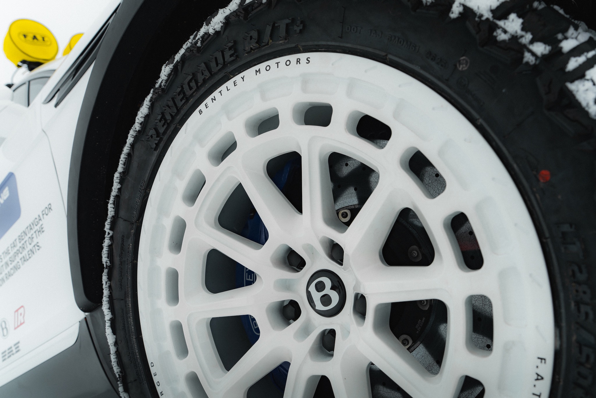 Closeup of 22-inch wheel on Bentley Bentayga X concept.