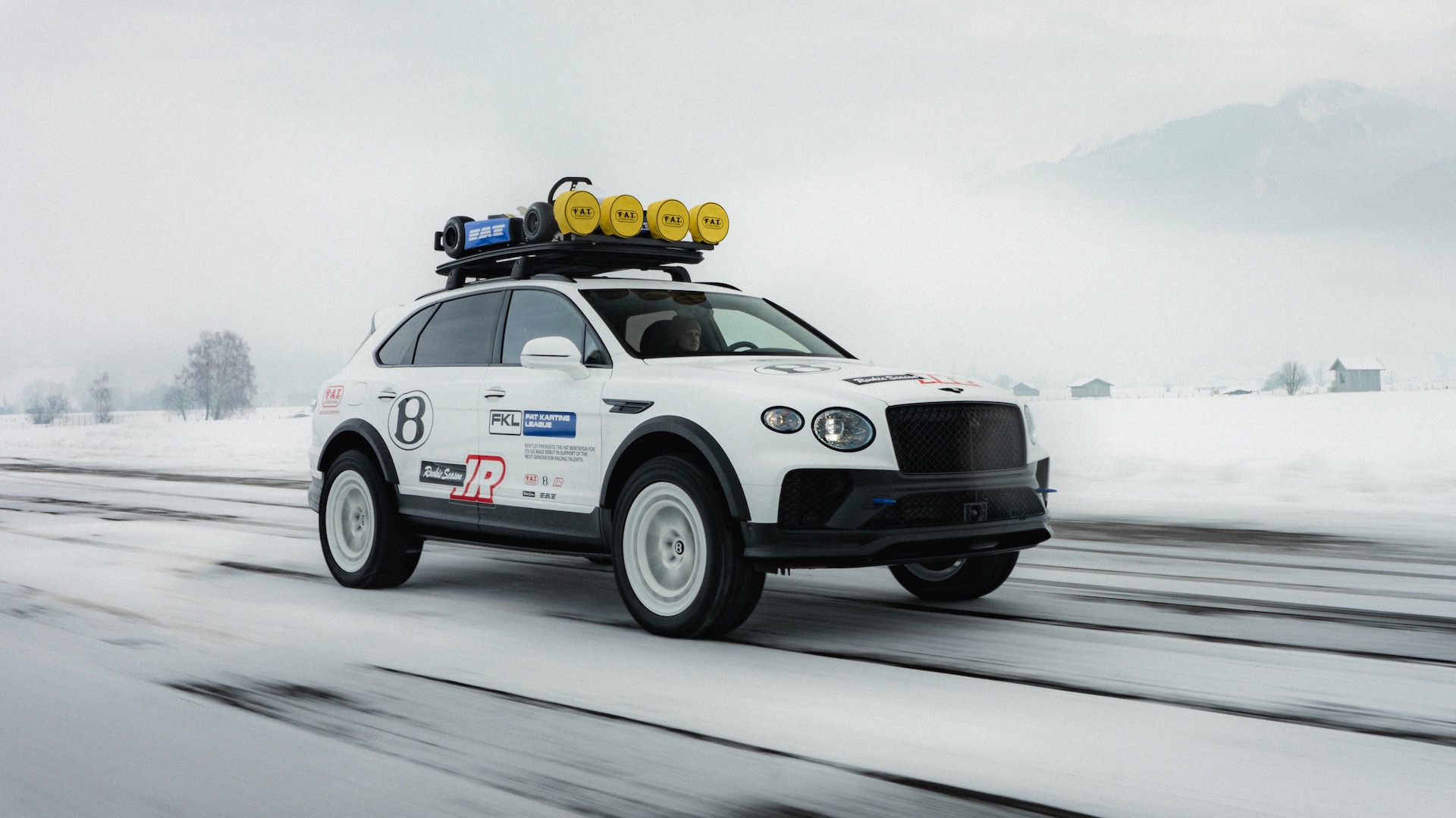 Bentley Bentayga X concept driving through fog.