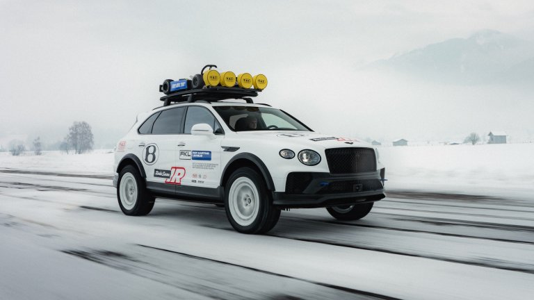 Bentley Bentayga X concept driving through fog.